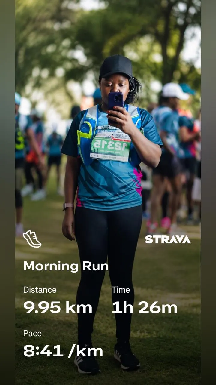 Laura Atieno at the Nairobi City Marathon finish area, Strava race card showing 9.95km in 1 hour 26 minutes