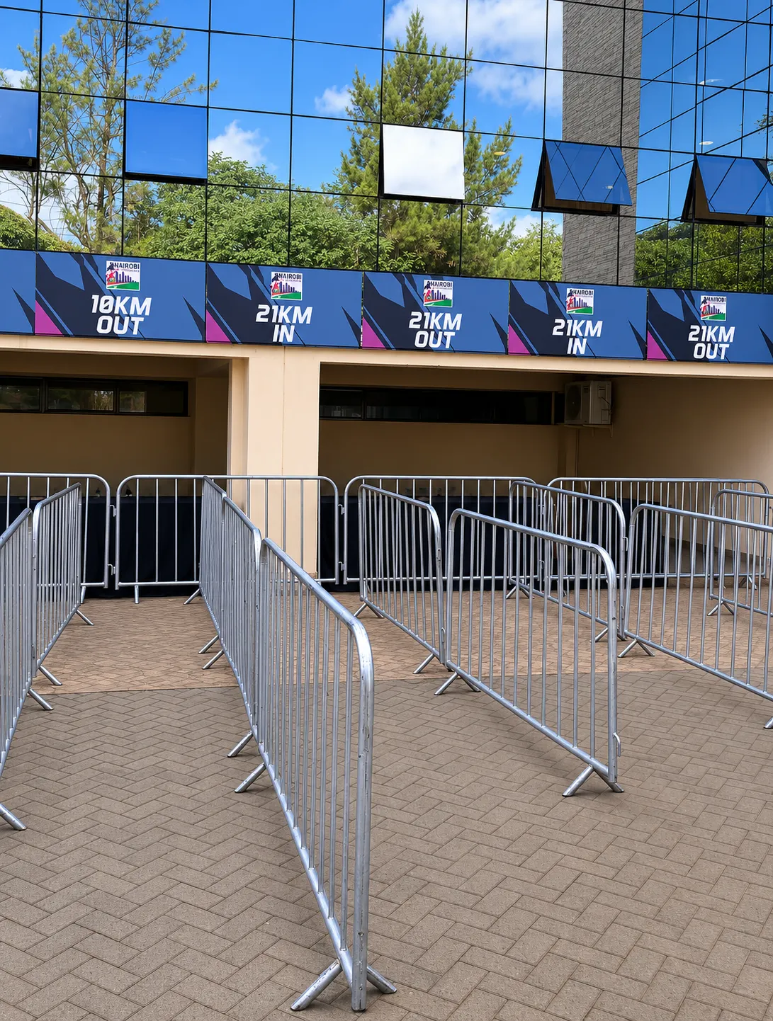 Nairobi City Marathon race entry gates showing separate lanes for 10KM and 21KM categories